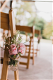 Rebecca Stevenson Photography of Wedding Chair with Flowers