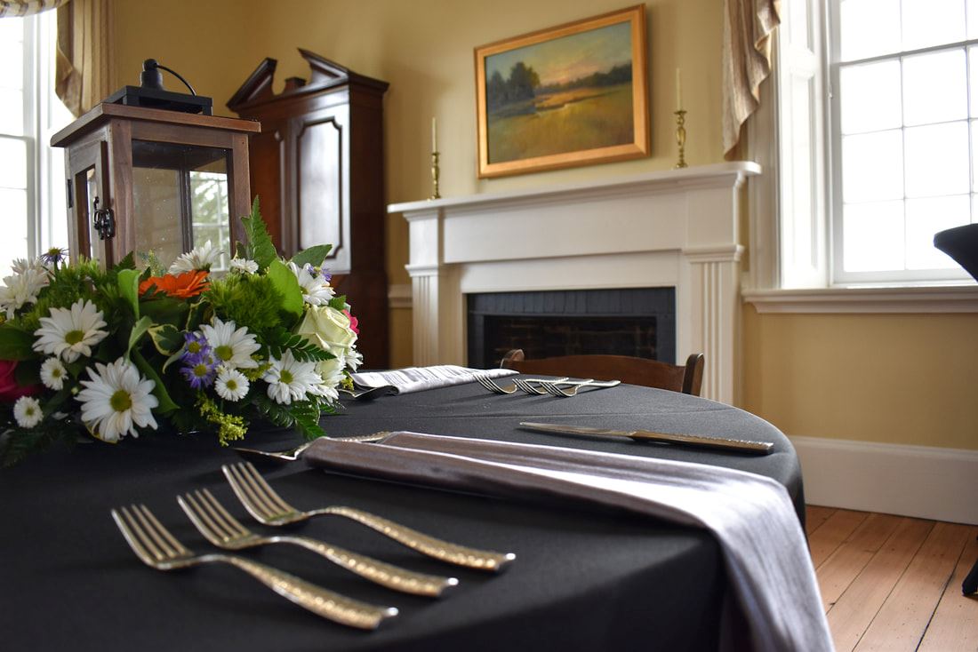 Living Room Table Close Up with Flowers - The Main Event by Emily